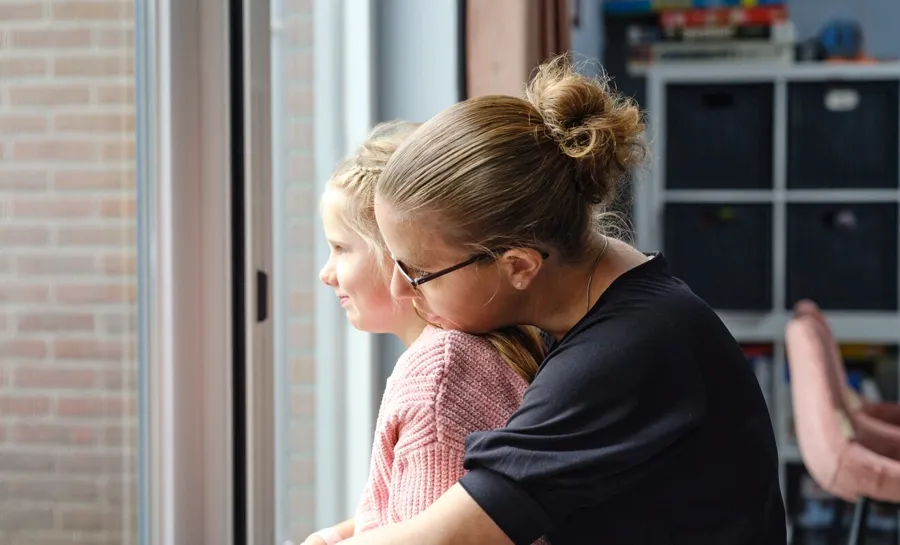 Candid photo of Marianne and her daughter. When Marianne’s condition worsened, she contacted her doctor. Eventually, she was diagnosed with MS. 